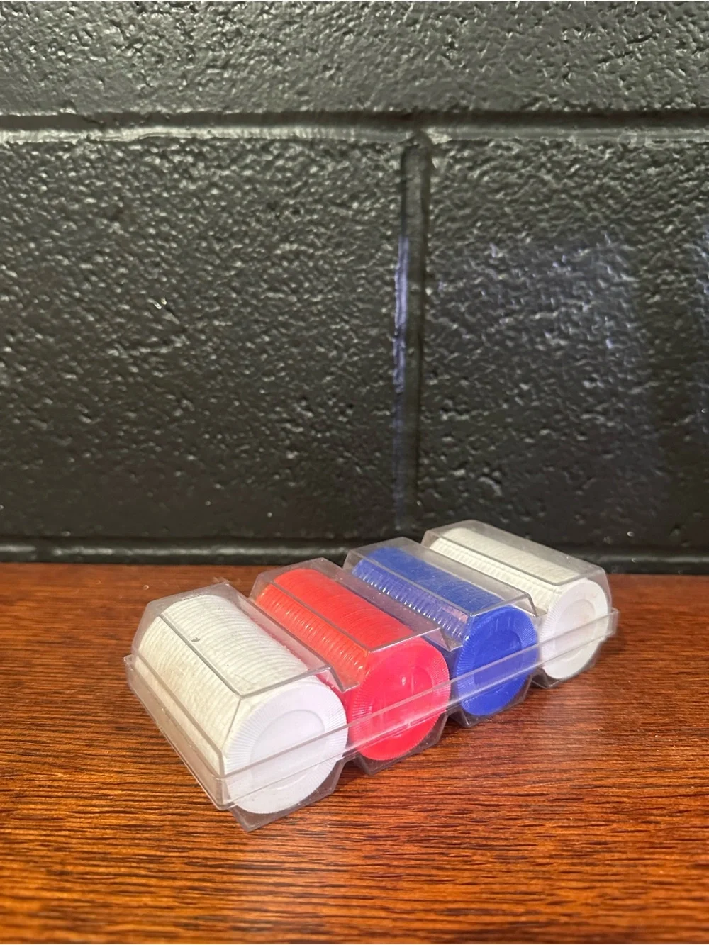 Red, Blue and White Poker Chips in Clear Case